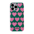 Phone case with pink hearts on a green background